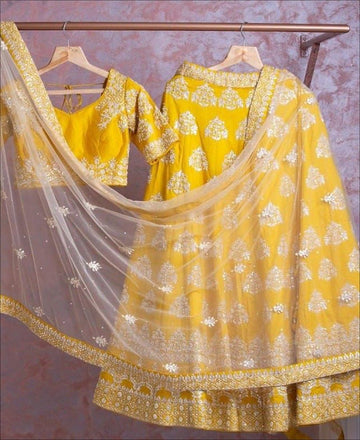 Yellow EMBROIDERY work  lehenga choli with  NET dupatta