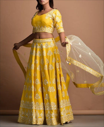 Yellow EMBROIDERY work  lehenga choli with  NET dupatta